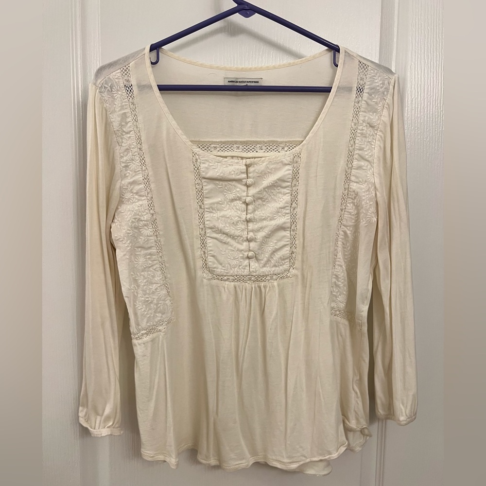 american eagle outfitters • size L • cream blouse with lace overlay & stitching